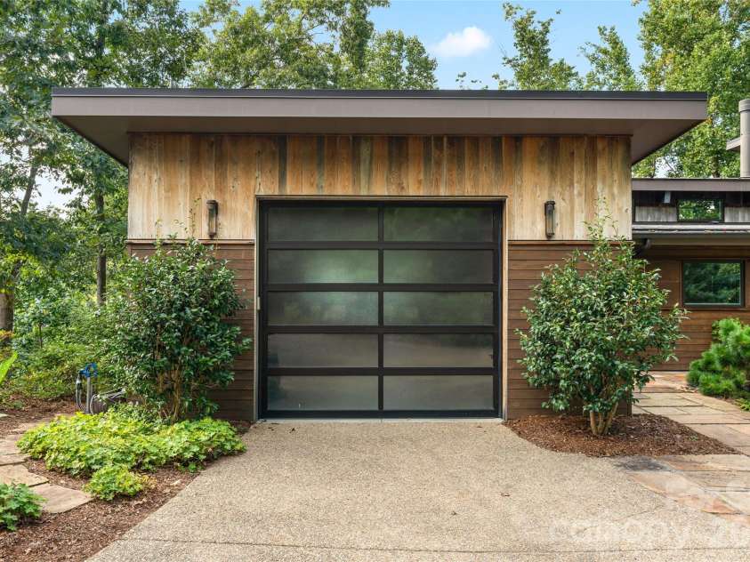 34 Bee Balm Way, Asheville, NC 28804.  MLS# CAR4420482, YatesRealty ID 53633. One car attached garage with workshop space.