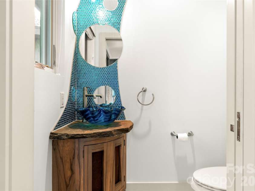34 Bee Balm Way, Asheville, NC 28804.  MLS# CAR4420482, YatesRealty ID 53633. The guest half bath, inspired by the ocean.