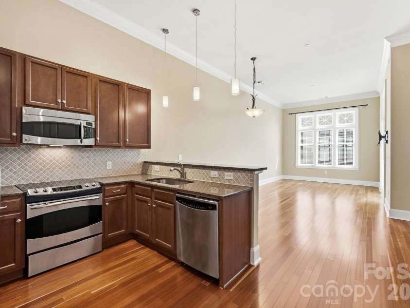2810 Selwyn Avenue, Charlotte, NC 28209.  MLS# CAR4429543, YatesRealty ID 53652. Kitchen and Living Room