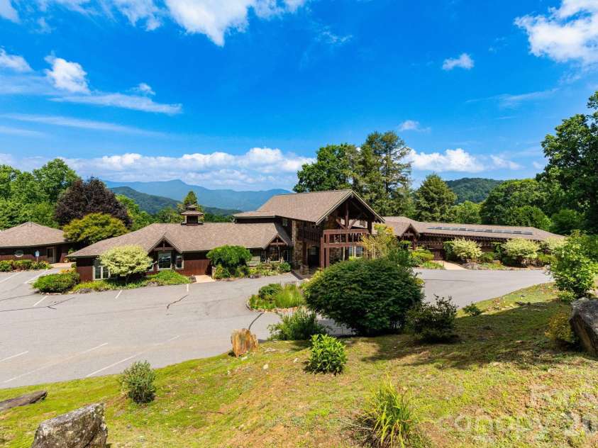 30 Finlaystone Trace, Waynesville, NC 28786.  MLS# CAR4425626, YatesRealty ID 53671. Clubhouse with ample parking.