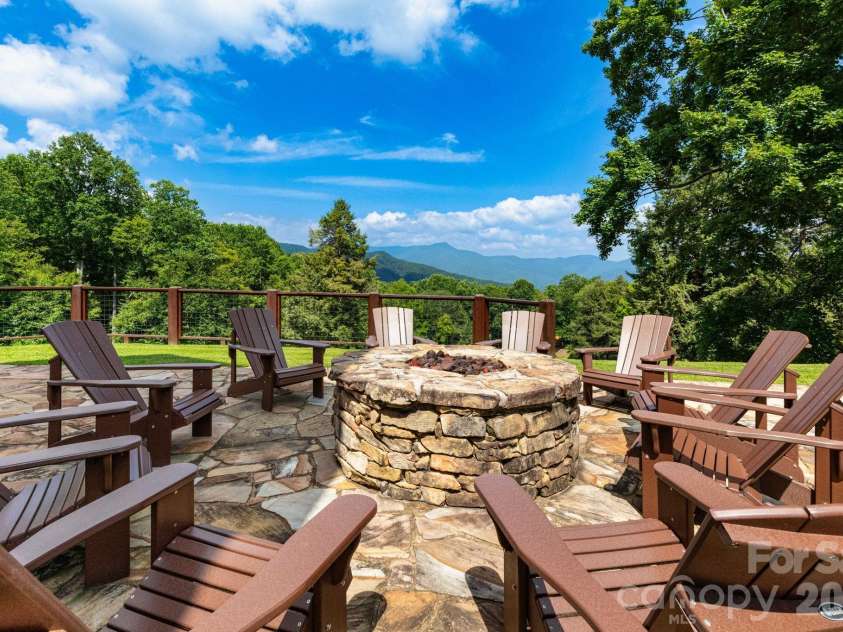 30 Finlaystone Trace, Waynesville, NC 28786.  MLS# CAR4425626, YatesRealty ID 53671. Firepit overlooking the mountains.