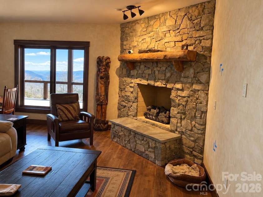 30 Finlaystone Trace, Waynesville, NC 28786.  MLS# CAR4425626, YatesRealty ID 53671. Floorplan for downstairs has an open flex space (this one has a fireplace and second family room).