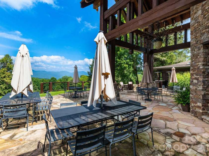 30 Finlaystone Trace, Waynesville, NC 28786.  MLS# CAR4425626, YatesRealty ID 53671. Mountain views while dining outside.