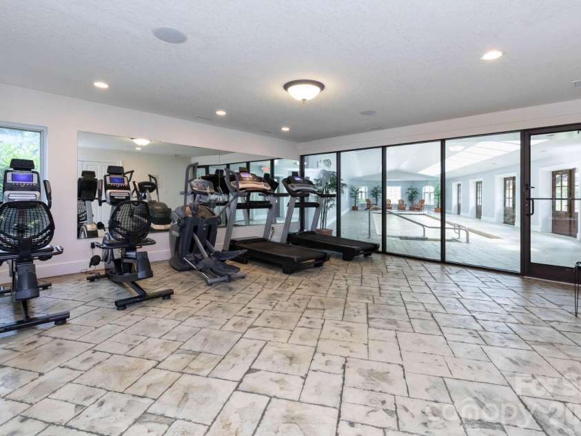 25 Finlaystone Trace, Waynesville, NC 28786.  MLS# CAR4425631, YatesRealty ID 53676. Gym.