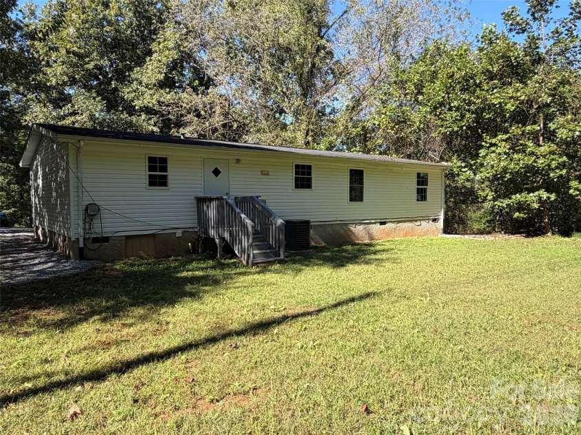 1034 Hidden View Loop, Marion, NC 28752.  MLS# CAR4429503, YatesRealty ID 53677. Back of house