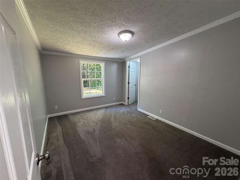 1034 Hidden View Loop, Marion, NC 28752.  MLS# CAR4429503, YatesRealty ID 53677. Bedroom 1