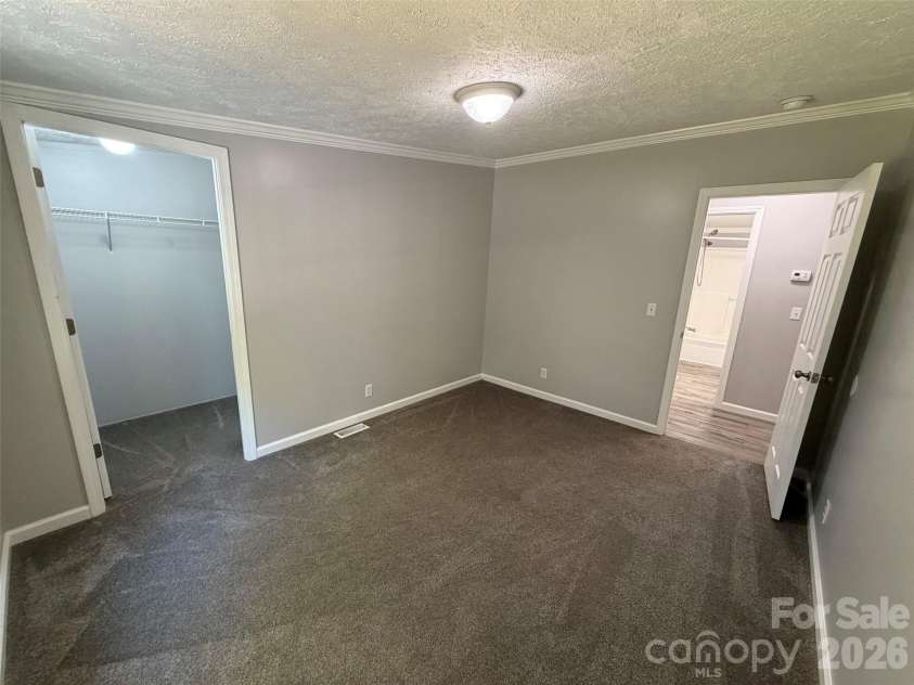 1034 Hidden View Loop, Marion, NC 28752.  MLS# CAR4429503, YatesRealty ID 53677. Bedroom 1