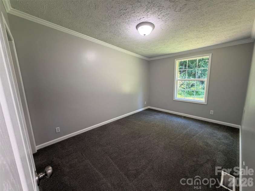 1034 Hidden View Loop, Marion, NC 28752.  MLS# CAR4429503, YatesRealty ID 53677. Bedroom 2