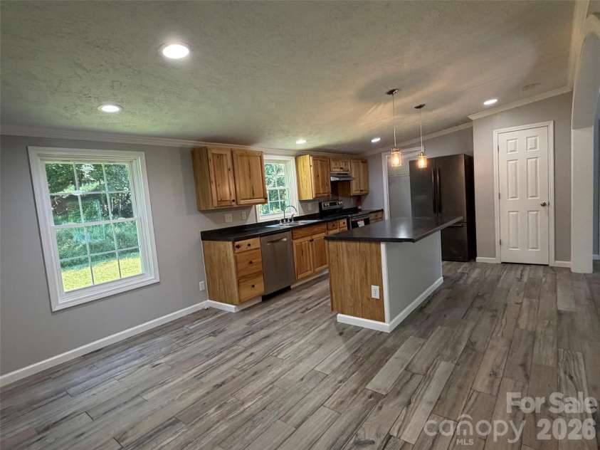1034 Hidden View Loop, Marion, NC 28752.  MLS# CAR4429503, YatesRealty ID 53677. Kitchen/ dining area