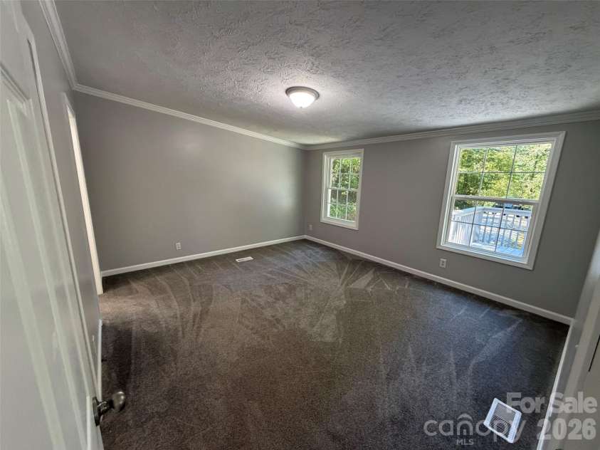 1034 Hidden View Loop, Marion, NC 28752.  MLS# CAR4429503, YatesRealty ID 53677. Primary Bedroom