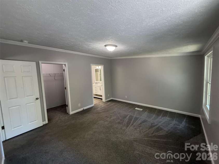 1034 Hidden View Loop, Marion, NC 28752.  MLS# CAR4429503, YatesRealty ID 53677. Primary Bedroom