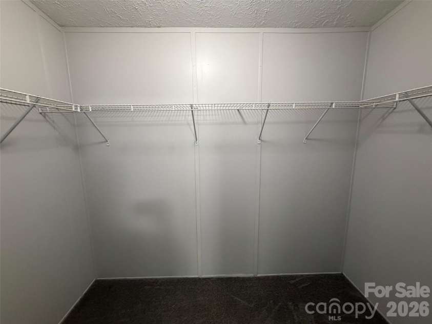 1034 Hidden View Loop, Marion, NC 28752.  MLS# CAR4429503, YatesRealty ID 53677. Primary Walk in closet