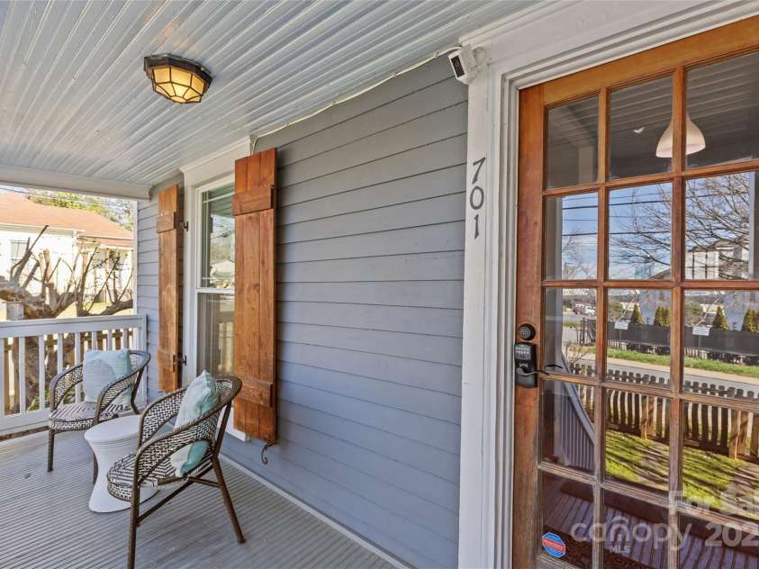 701 Torrence Street, Charlotte, NC 28204.  MLS# CAR4225479, YatesRealty ID 5368. Beautiful view of CLT skyline from front porch.
