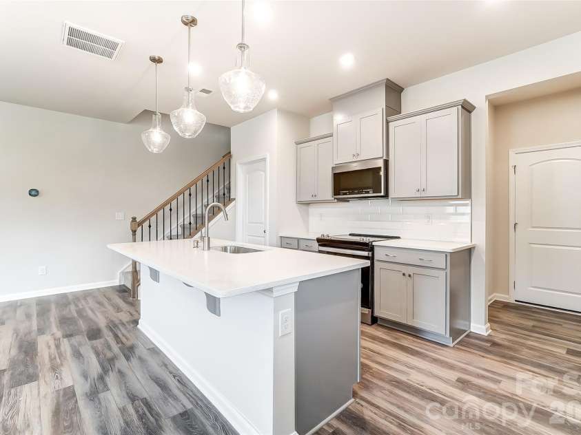 5225 Wyes Oak Lane, Charlotte, NC 28269.  MLS# CAR4429742, YatesRealty ID 53682. Photos are representative