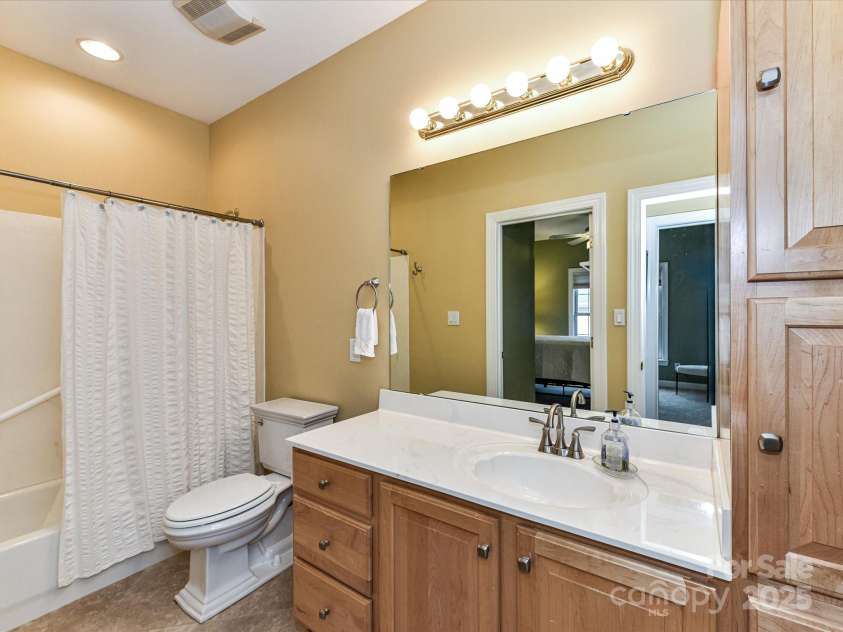 11406 Olde Turnbury Court, Charlotte, NC 28277.  MLS# CAR4233679, YatesRealty ID 5369. Bathroom storage features a 