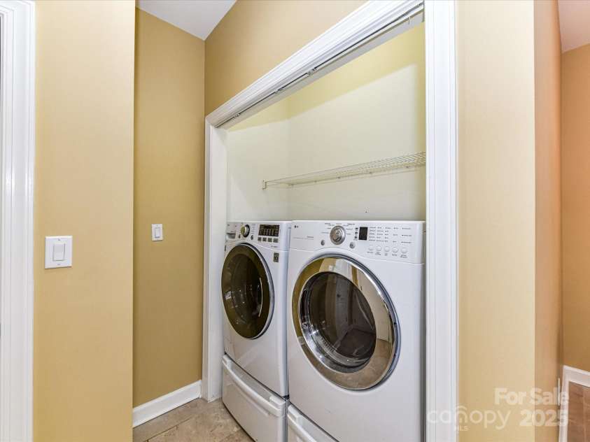 11406 Olde Turnbury Court, Charlotte, NC 28277.  MLS# CAR4233679, YatesRealty ID 5369. Full sized washer and dryer on pedestals for ease of access!