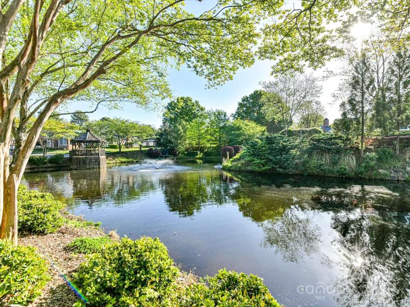 11406 Olde Turnbury Court, Charlotte, NC 28277.  MLS# CAR4233679, YatesRealty ID 5369. Just across the street is the walking path around the pond!