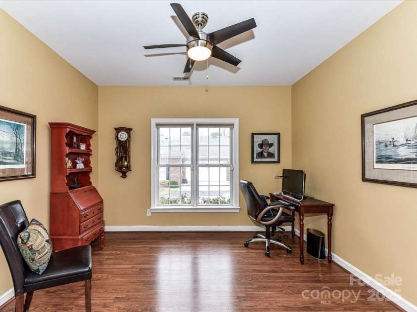 11406 Olde Turnbury Court, Charlotte, NC 28277.  MLS# CAR4233679, YatesRealty ID 5369. The Den or optional 3rd bedroom- built in shelves with cabinet.