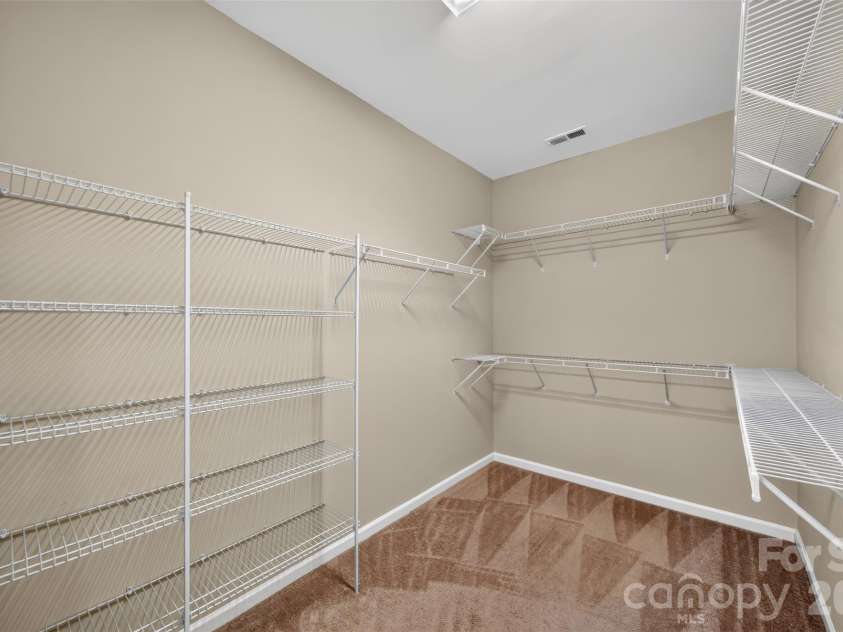 12910 Hunting Birds Lane, Charlotte, NC 28278.  MLS# CAR4427177, YatesRealty ID 53694. Oversized Primary Closet