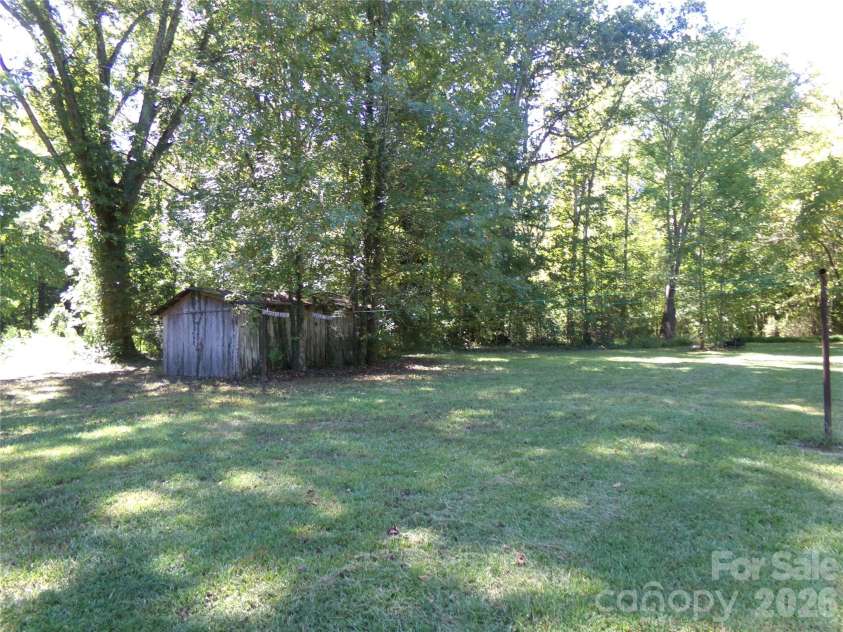 44731 Gold Branch Road, Richfield, NC 28137.  MLS# CAR4428570, YatesRealty ID 53701. Small outbuilding rear yard