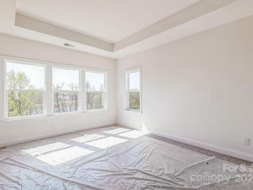 2124 Barrowcliffe Drive, Concord, NC 28027.  MLS# CAR4245354, YatesRealty ID 5373. Primary bedroom with raised ceiling