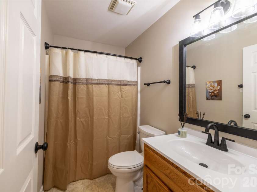32802 Austin Road, New London, NC 28127.  MLS# CAR4428929, YatesRealty ID 53742. Hall / Second Bathroom