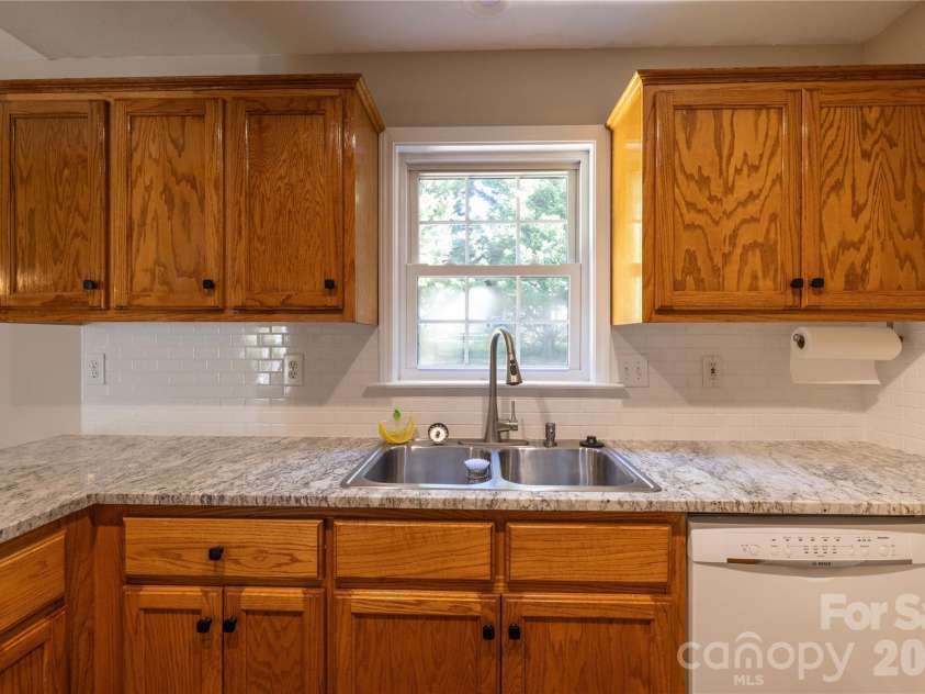 32802 Austin Road, New London, NC 28127.  MLS# CAR4428929, YatesRealty ID 53742. Kitchen New Counter Tops & Backsplash