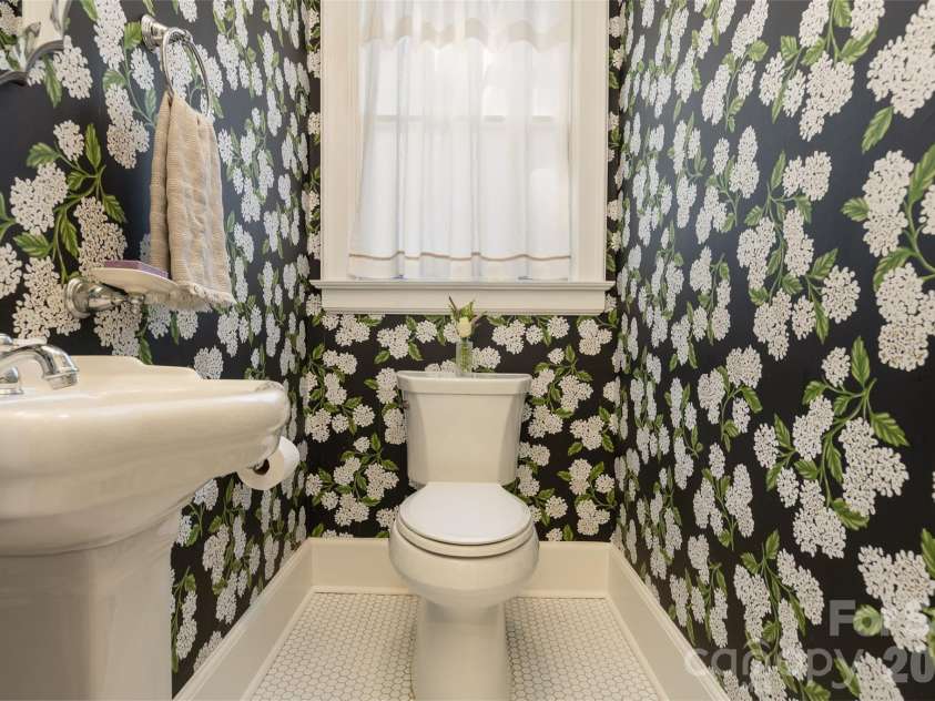 200 Kimberly Avenue, Asheville, NC 28804.  MLS# CAR4429013, YatesRealty ID 53751. Main floor half bath.