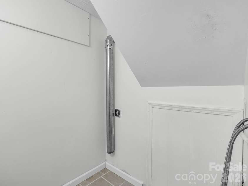 697 Courtney Drive, Hendersonville, NC 28792.  MLS# CAR4429227, YatesRealty ID 53752. Basement laundry