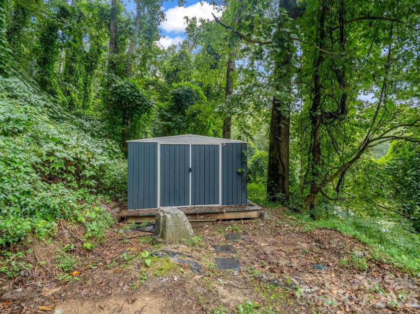697 Courtney Drive, Hendersonville, NC 28792.  MLS# CAR4429227, YatesRealty ID 53752. Shed for extra storage