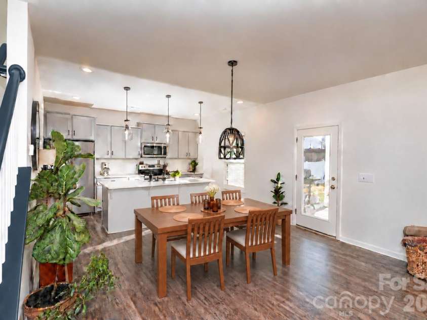 106 Stonewater Drive, Stanfield, NC 28163.  MLS# CAR4422919, YatesRealty ID 53764. Gorgeous kitchen with large island and spacious dining area