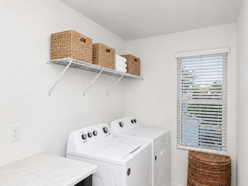 106 Stonewater Drive, Stanfield, NC 28163.  MLS# CAR4422919, YatesRealty ID 53764. Large laundry room with folding table