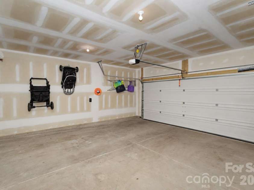 106 Stonewater Drive, Stanfield, NC 28163.  MLS# CAR4422919, YatesRealty ID 53764. Spacious 2 car garage