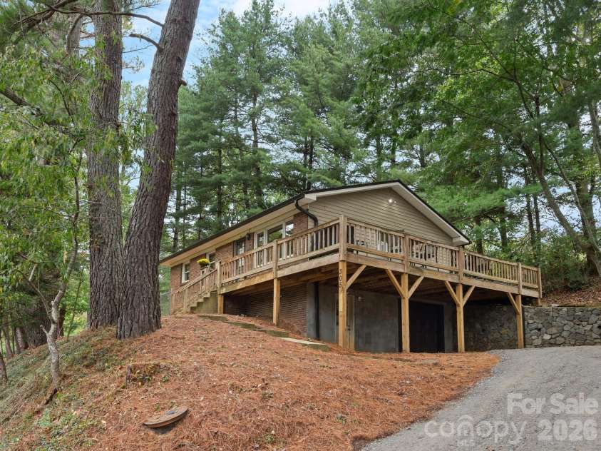 305 Youngs Cove Road, Candler, NC 28715.  MLS# CAR4427109, YatesRealty ID 53775. Side Exterior
