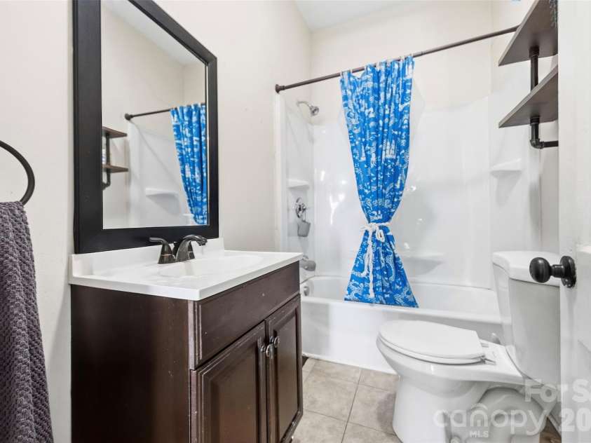 407 South Street, Gastonia, NC 28052.  MLS# CAR4429534, YatesRealty ID 53777. Full bathroom downstairs