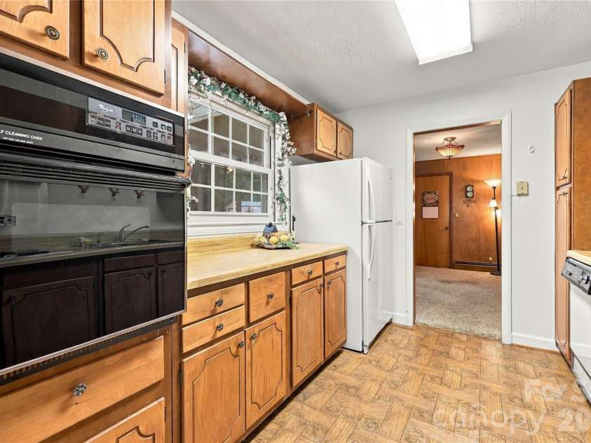 1641 Camelot Drive, Hendersonville, NC 28739.  MLS# CAR4418926, YatesRealty ID 53780. Galley Kitchen -