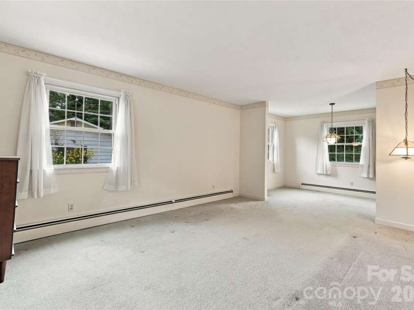 1641 Camelot Drive, Hendersonville, NC 28739.  MLS# CAR4418926, YatesRealty ID 53780. Living - Dining