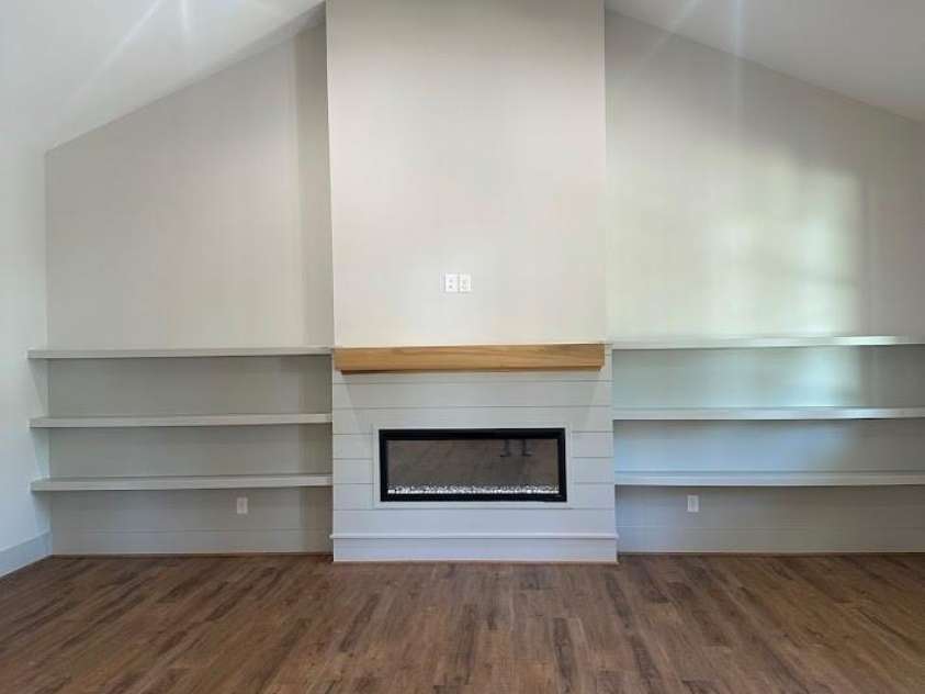 113 Todd Drive, Concord, NC 28025.  MLS# CAR4423232, YatesRealty ID 53783. Great room with electric fireplace