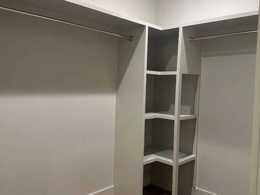 113 Todd Drive, Concord, NC 28025.  MLS# CAR4423232, YatesRealty ID 53783. Master bedroom walk in closet with built in shelves