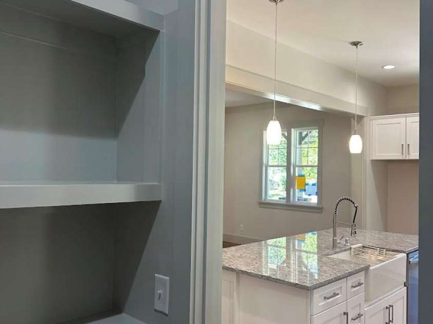 113 Todd Drive, Concord, NC 28025.  MLS# CAR4423232, YatesRealty ID 53783. View of kitchen from pantry