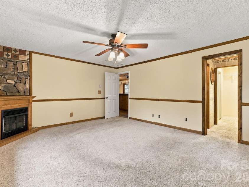 75 Crosswick Lane, Hendersonville, NC 28739.  MLS# CAR4418925, YatesRealty ID 53785. Ensuite with Fireplace -