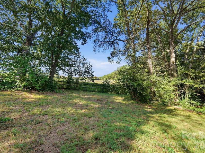 807 218 Highway, Monroe, NC 28110.  MLS# CAR4428091, YatesRealty ID 53786. Back yard