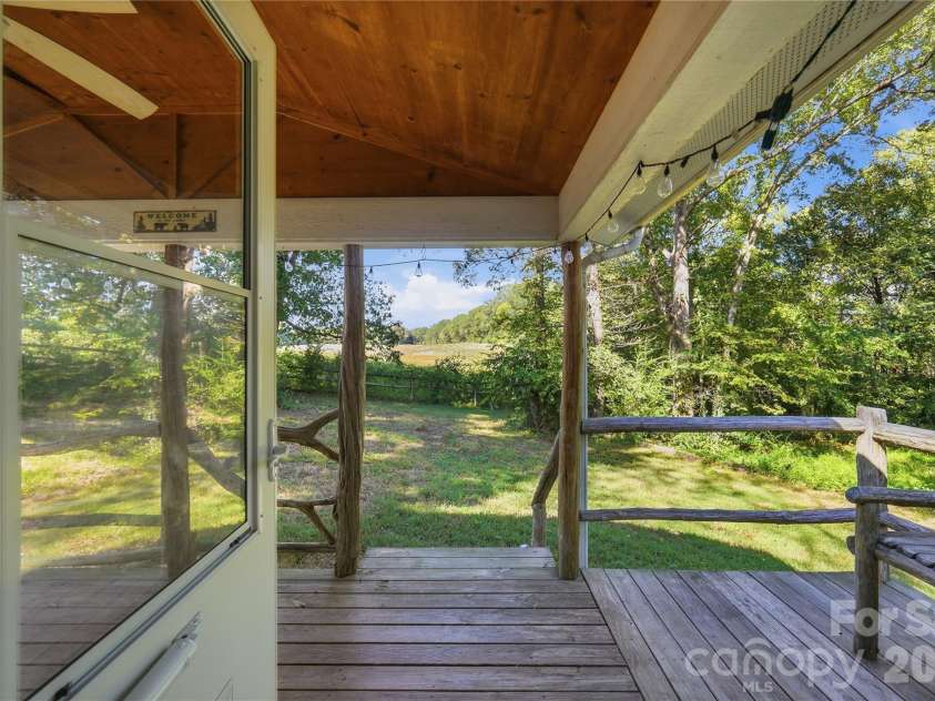 807 218 Highway, Monroe, NC 28110.  MLS# CAR4428091, YatesRealty ID 53786. Covered back porch