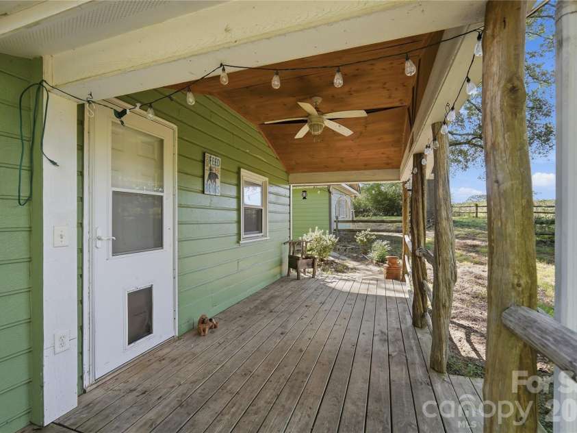 807 218 Highway, Monroe, NC 28110.  MLS# CAR4428091, YatesRealty ID 53786. Covered back porch