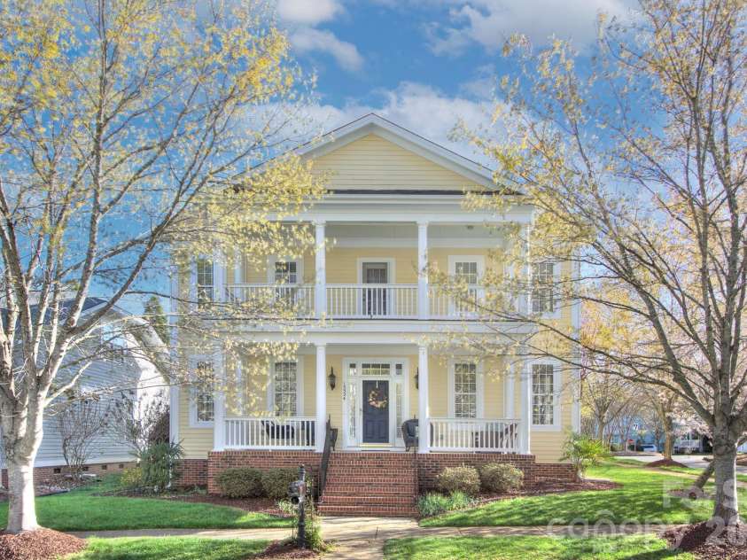 15324 Barnsbury Drive, Huntersville, NC 28078.  MLS# CAR4358717, YatesRealty ID 5379. Beautiful double porch home