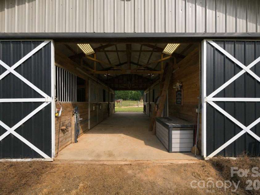 1125 Ballpark Drive, Mooresville, NC 28115.  MLS# CAR4426293, YatesRealty ID 53791. Barn
