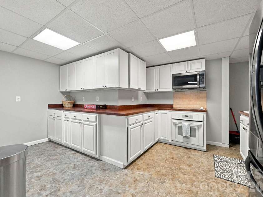 1125 Ballpark Drive, Mooresville, NC 28115.  MLS# CAR4426293, YatesRealty ID 53791. Basement Kitchen