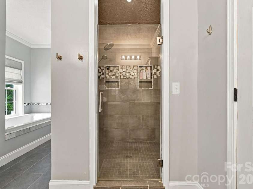 1125 Ballpark Drive, Mooresville, NC 28115.  MLS# CAR4426293, YatesRealty ID 53791. Primary Bath