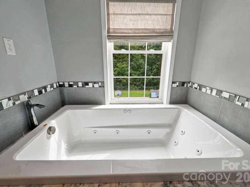 1125 Ballpark Drive, Mooresville, NC 28115.  MLS# CAR4426293, YatesRealty ID 53791. Primary Bath