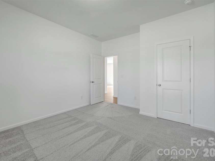 1410 Bucknell Street, Wingate, NC 28174.  MLS# CAR4429173, YatesRealty ID 53794. First floor bedroom